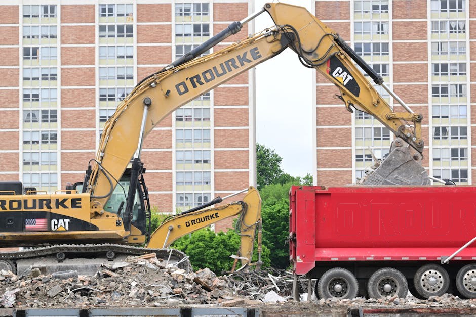 Dump truck hauling debris from a job site
